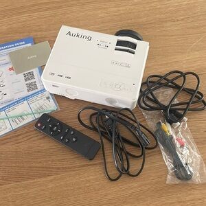 AuKing Projector, 2024 Upgraded Mini Projector in White